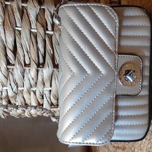 BCBGeneration purse. NEW no tags. Never carried . Great condition.